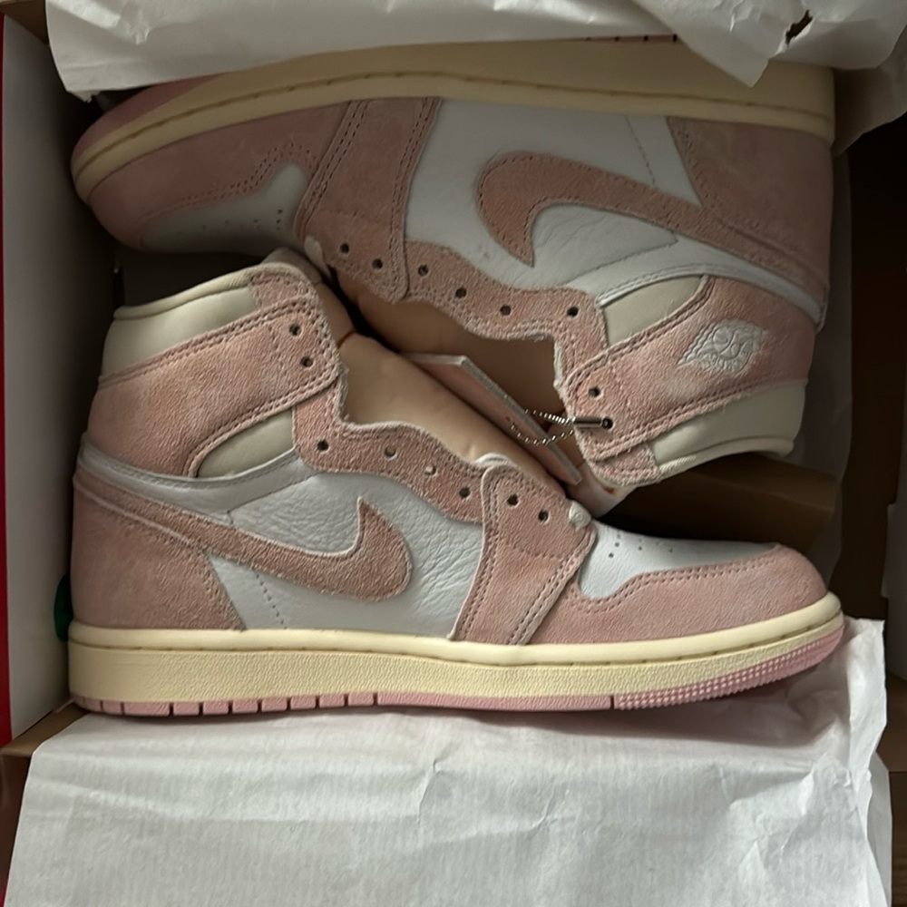 Light pink and white high-top Nike Dunks